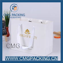 Elegante bolsa de ropa de papel blanco con estampado en caliente de logotipo de oro